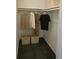 Organized closet with hanging storage, shelving, and ample space at 14500 E 2Nd Ave # 209A, Aurora, CO 80011