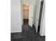 Interior view of an open closet, showcasing rod for hanging clothes and storage at 14500 E 2Nd Ave # 209A, Aurora, CO 80011