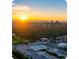 Spectacular aerial view of the Denver skyline at sunset, with lush greenery and expansive city views at 460 S Marion Pkwy # 251, Denver, CO 80209