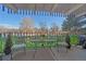 Relaxing balcony with outdoor seating, a table, and a view of the neighborhood at 460 S Marion Pkwy # 251, Denver, CO 80209