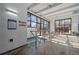 Indoor pool entrance, with 'No Diving' sign and tiled flooring, ensures safety and accessibility for all residents at 460 S Marion Pkwy # 251, Denver, CO 80209