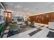 Inviting lobby area featuring comfortable seating, elegant lighting fixtures, and stylish wood paneling, for a welcoming atmosphere at 460 S Marion Pkwy # 251, Denver, CO 80209