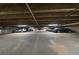 Well-lit parking garage with designated parking spots available for residents and guests, ensuring convenient parking at 460 S Marion Pkwy # 251, Denver, CO 80209