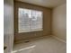 Neutral bedroom featuring plush carpeting, a window for natural light, and neutral walls at 1057 English Sparrow Trl, Highlands Ranch, CO 80129