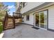 Exterior showcases a wooden deck, stairs, and a concrete patio with sliding glass door access at 7345 W 97Th Pl, Broomfield, CO 80021