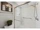 Beautiful bathroom showcasing glass-enclosed shower with marble-like tile and modern fixtures at 7345 W 97Th Pl, Broomfield, CO 80021