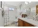 Stylized bathroom decorated with whimsical elephant decor and a shower-tub combination at 7345 W 97Th Pl, Broomfield, CO 80021