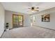 Neutral bedroom featuring a slider door to the outside deck, and carpeted floors at 7345 W 97Th Pl, Broomfield, CO 80021