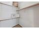 Walk-in closet providing ample shelving and storage solutions for an organized wardrobe at 7345 W 97Th Pl, Broomfield, CO 80021