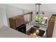 An aerial view of a kitchen with granite countertops and stainless steel appliances at 7345 W 97Th Pl, Broomfield, CO 80021