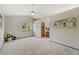 Spacious main bedroom with a ceiling fan and an ensuite bathroom for added convenience at 7345 W 97Th Pl, Broomfield, CO 80021
