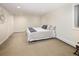 Basement bedroom with carpet floors, a radiator, and a double door closet at 2134 S Jackson St, Denver, CO 80210
