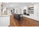 Gourmet kitchen with large center island, stainless appliances and open floorplan at 2134 S Jackson St, Denver, CO 80210