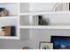 Close-up of built-in shelving with decorative items and books at 2134 S Jackson St, Denver, CO 80210