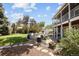 Beautiful backyard patio area with outdoor seating and a lush lawn perfect for entertaining and relaxation at 9383 W Colorado Ave, Lakewood, CO 80232
