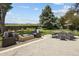 Large backyard patio features outdoor dining, lounge seating and gorgeous mountain views at 9383 W Colorado Ave, Lakewood, CO 80232