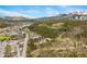 Scenic aerial view showcasing the condo's location, the surrounding town, and majestic mountain backdrop at 877 Airport Rd # 19, Breckenridge, CO 80424