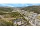Overhead view capturing the property, surrounding landscape, and nearby highway access for convenient travel at 877 Airport Rd # 19, Breckenridge, CO 80424