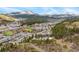 Breathtaking aerial view of the town and mountains showcasing the condo's scenic location and surrounding landscape at 877 Airport Rd # 19, Breckenridge, CO 80424