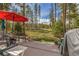 Landscaped backyard with patio and seating, perfect for enjoying the natural surroundings and outdoor relaxation at 877 Airport Rd # 19, Breckenridge, CO 80424