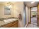 Well-lit bathroom with granite vanity and walk-in shower; the bedroom is visible at 877 Airport Rd # 19, Breckenridge, CO 80424