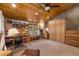 Spacious bedroom with ample storage, wood-paneled ceiling, and built-in shelving at 877 Airport Rd # 19, Breckenridge, CO 80424