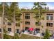 Charming multi-story condo building with private patios, perfect for outdoor gatherings and relaxation at 877 Airport Rd # 19, Breckenridge, CO 80424
