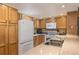 Efficient kitchen with white appliances and ample cabinet space at 877 Airport Rd # 19, Breckenridge, CO 80424