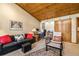A cozy workspace featuring a comfortable sofa, workspace and natural lighting at 877 Airport Rd # 19, Breckenridge, CO 80424
