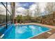 Relaxing outdoor pool area with lounge chairs and mountain views, perfect for resort-style living at 877 Airport Rd # 19, Breckenridge, CO 80424