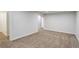 Spacious finished basement with neutral walls, carpeted floors, and recessed lighting at 230 W 78Th Pl, Denver, CO 80221