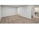 Finished basement with neutral walls, carpeted floors, and includes a laundry area at 230 W 78Th Pl, Denver, CO 80221