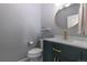 Stylish half-bathroom with contemporary fixtures and decor at 4100 Albion St # 205, Denver, CO 80216