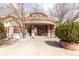 A welcoming brick entrance with ample landscaping creates an inviting arrival experience at 4100 Albion St # 205, Denver, CO 80216