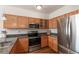 Well-equipped kitchen featuring stainless steel appliances and sleek countertops at 4100 Albion St # 205, Denver, CO 80216