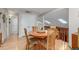 Well-lit dining area with skylights, hardwood floors, and easy access to other living spaces at 1080 Tantra Park Cir, Boulder, CO 80305