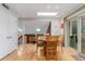 Charming dining area with skylight, stairs to second floor, and access to the outside at 1080 Tantra Park Cir, Boulder, CO 80305