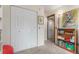 Hallway featuring a large closet and access to additional rooms at 1080 Tantra Park Cir, Boulder, CO 80305