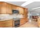 Modern kitchen with stainless appliances, granite countertops, and plenty of cabinets at 1080 Tantra Park Cir, Boulder, CO 80305
