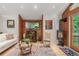 Cozy living room featuring a fireplace, modern decor, and wood accents at 1080 Tantra Park Cir, Boulder, CO 80305