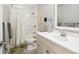 Clean and well-maintained bathroom with a shower and a white vanity at 962 Uvalda St, Aurora, CO 80011