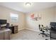 The bedroom features two desks and plenty of space at 962 Uvalda St, Aurora, CO 80011