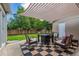 Charming patio area, perfect for outdoor living with a black and white rug at 962 Uvalda St, Aurora, CO 80011