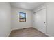 Bedroom with hardwood floors, natural light and a sliding door closet at 1360 S Forest Way, Denver, CO 80222