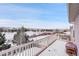 Snowy view from a deck overlooking a neighborhood at 2229 Candleglow St, Castle Rock, CO 80109