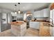 Modern kitchen featuring granite countertops, an island, and stainless steel appliances at 2229 Candleglow St, Castle Rock, CO 80109