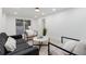 Finished basement recreation area with seating and backyard access at 3360 Broadway St, Boulder, CO 80304