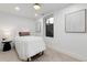 Basement bedroom with a single bed, nightstand, and neutral decor at 3360 Broadway St, Boulder, CO 80304