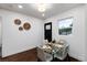 Small dining area with glass table and four chairs at 3360 Broadway St, Boulder, CO 80304