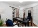 Spacious home office with a desk and French doors at 3360 Broadway St, Boulder, CO 80304